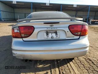 2003 Oldsmobile Alero GL1 z VIN 1G3NL52F43C291875, wystawiony jako Copart lot #74620764 z przebiegiem Nie podano mil oraz Szkoda całkowita • Salvage title. Historia ofert i sprzedaży dostępna na DreamBid. Obrazek 6.