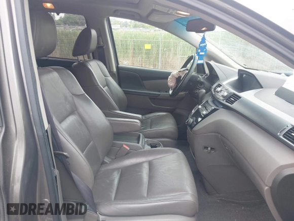 2011 Honda Odyssey EX-L with VIN 5FNRL5H64BB029087, listed as a IAAI auction lot 42508764 with 214,705 mi miles and . Bid and sale history available at DreamBid. Image 5.