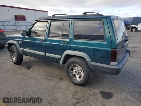 1998 Jeep Cherokee Sport with VIN 1J4FT68S2WL236774, listed as a Copart auction lot 77388734 with 128,591 mi miles and Clean Title. Bid and sale history available at carsss.com. Image 2.
