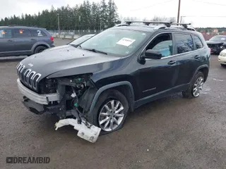 2014 Jeep Cherokee Limited with VIN 1C4PJMDB7EW110286, listed as a IAAI auction lot 41900954 with 167,262 mi miles. Bid and sale history available at carsss.com. Image 2.