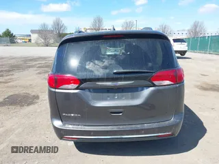 2018 Chrysler Pacifica Touring L with VIN 2C4RC1BGXJR356199, listed as a IAAI auction lot 41886721 with 111,514 mi miles and . Bid and sale history available at DreamBid. Image 16.