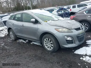 2011 Mazda CX-7 i SV with VIN JM3ER2AM5B0408559, listed as a IAAI auction lot 41550406 with 999,999 mi miles. Bid and sale history available at carsss.com. Image 1.