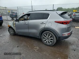 2018 Kia Sportage EX z VIN KNDPN3AC6J7364541, wystawiony jako Copart lot #56382695 z przebiegiem Nie podano mil oraz Szkoda całkowita • Salvage title. Historia ofert i sprzedaży dostępna na DreamBid. Obrazek 2.