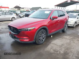 2018 Mazda CX-5 Grand Touring with VIN JM3KFBDM8J0406276, listed as a IAAI auction lot 41447355 with 70,772 mi miles. Bid and sale history available at carsss.com. Image 19.