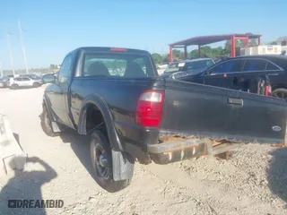 2003 Ford Ranger XL with VIN 1FTYR10U23PA44921, listed as a IAAI auction lot 41788023 with 128,034 mi miles. Bid and sale history available at carsss.com. Image 3.