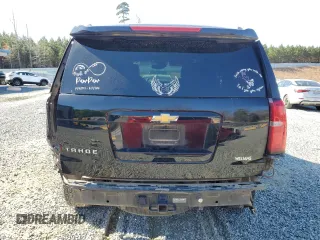 2015 Chevrolet Tahoe LT with VIN 1GNSCBKC0FR521749, listed as a Copart auction lot 50480075 with 156,940 mi miles and Salvage Title. Bid and sale history available at DreamBid. Image 6.