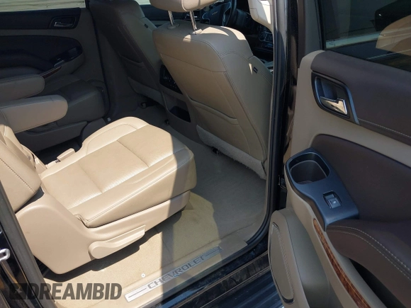 2019 Chevrolet Suburban LT with VIN 1GNSCJKC5KR304766, listed as a IAAI auction lot 42410264 with 105,171 mi miles and . Bid and sale history available at DreamBid. Image 8.