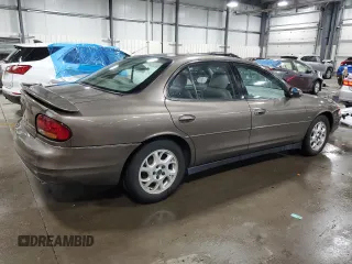 2002 Oldsmobile Intrigue GLS z VIN 1G3WX52HX2F109779, wystawiony jako Copart lot #52140934 z przebiegiem 66 159 mil mil oraz Szkody całkowita. Historia ofert i sprzedaży dostępna na DreamBid. Obrazek 3.
