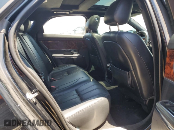 2011 Jaguar XJ with VIN SAJWA1CBXBLV12152, listed as a Copart auction lot 62010855 with 125,697 mi miles and Salvage title. Bid and sale history available at DreamBid. Image 10.