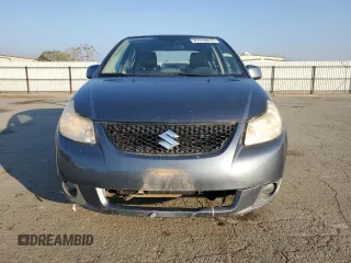 2009 Suzuki SX4 Man Sport FWD with VIN JS2YC414696202957, listed as a Copart auction lot 87470914 with 89,741 mi miles and Clean Title. Bid and sale history available at carsss.com. Image 5.