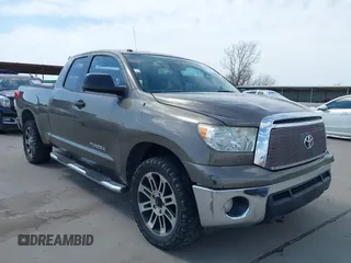 2013 Toyota Tundra z VIN 5TFRM5F15DX066372, wystawiony jako IAAI lot #41765318 z przebiegiem 147 508 mil mil oraz . Historia ofert i sprzedaży dostępna na DreamBid. Obrazek 1.