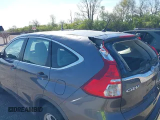 2015 Honda CR-V LX with VIN 2HKRM3H31FH557779, listed as a IAAI auction lot 42098299 with 211,683 mi miles and . Bid and sale history available at carsss.com. Image 20.