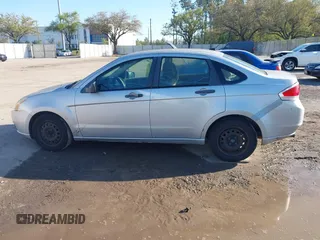 2009 Ford Focus S with VIN 1FAHP34N79W221813, listed as a IAAI auction lot 41758471 with 248,531 mi miles. Bid and sale history available at carsss.com. Image 14.