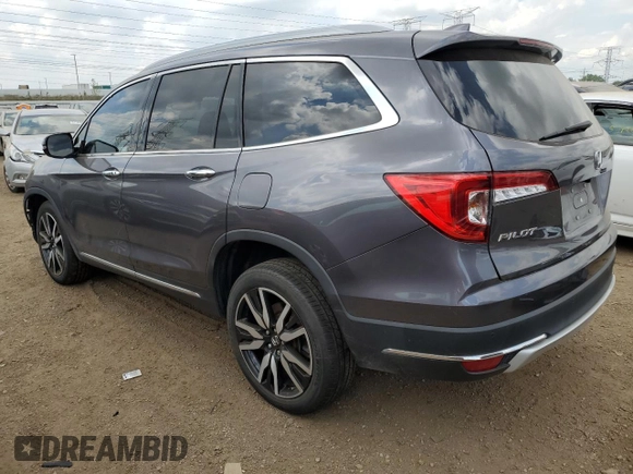 2022 Honda Pilot Touring 7-Passenger with VIN 5FNYF6H6XNB014347, listed as a Copart auction lot 56869745 with 31,513 mi miles and Salvage title. Bid and sale history available at DreamBid. Image 2.