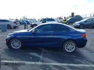 2016 BMW 2 Series 228i with VIN WBA1F9C55GV545295, listed as a IAAI auction lot 41539525 with 147,604 mi miles. Bid and sale history available at carsss.com. Image 14.