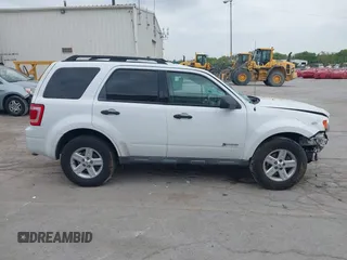 2010 Ford Escape Hybrid with VIN 1FMCU4K30AKC27870, listed as a IAAI auction lot 42246083 with 127,782 mi miles and . Bid and sale history available at DreamBid. Image 13.