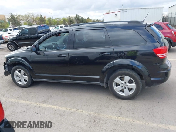 2013 Dodge Journey American Value with VIN 3C4PDCAB2DT502182, listed as a IAAI auction lot 42074092 with 151,997 mi miles and . Bid and sale history available at DreamBid. Image 14.