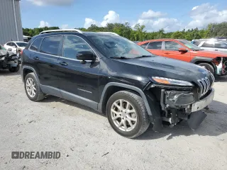 2018 Jeep Cherokee Latitude Plus with VIN 1C4PJLLB2JD524285, listed as a Copart auction lot 51236325 with 133,465 mi miles and Salvage Title. Bid and sale history available at DreamBid. Image 4.