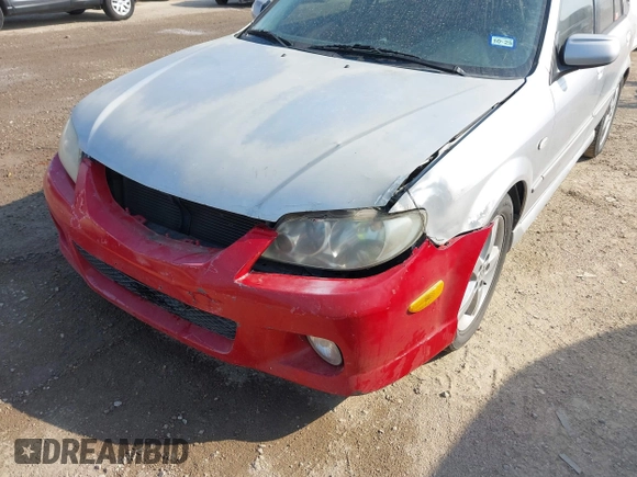2003 Mazda Protege with VIN JM1BJ245031218333, listed as a IAAI auction lot 42070471 with 181,748 mi miles and . Bid and sale history available at DreamBid. Image 6.