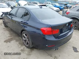 2014 BMW 3 Series 328i with VIN WBA3C1C56EK108665, listed as a IAAI auction lot 42101319 with 84,928 mi miles and . Bid and sale history available at DreamBid. Image 3.
