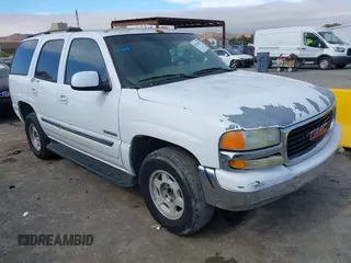 2003 GMC Yukon SLE z VIN 1GKEC13V13J318125, wystawiony jako IAAI lot #42830566 z przebiegiem 257 095 mil mil oraz . Historia ofert i sprzedaży dostępna na DreamBid. Obrazek 1.
