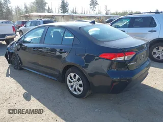 2023 Toyota Corolla LE with VIN 5YFB4MDE9PP032701, listed as a IAAI auction lot 42111425 with 29,744 mi miles. Bid and sale history available at carsss.com. Image 3.