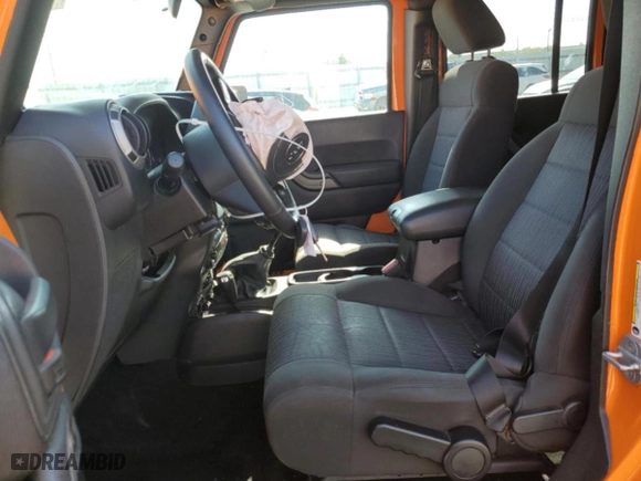 2012 Jeep Wrangler Unlimited Sport with VIN 1C4BJWDG3CL285361, listed as a Copart auction lot 51110315 with 198,251 mi miles and Salvage Title. Bid and sale history available at carsss.com. Image 7.