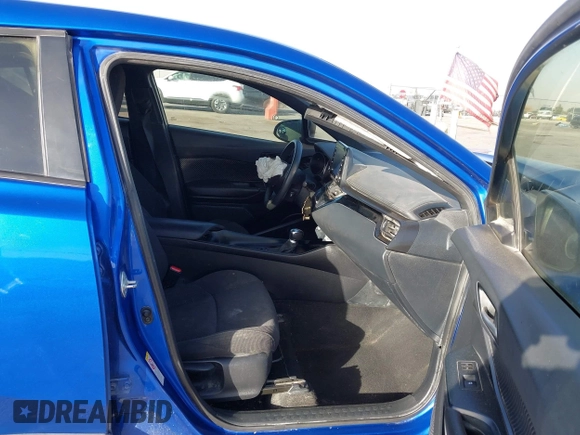 2019 Toyota C-HR XLE with VIN NMTKHMBX3KR098510, listed as a IAAI auction lot 41289899 with 112,981 mi miles. Bid and sale history available at carsss.com. Image 5.