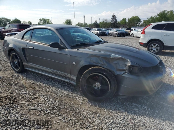 2004 Ford Mustang Standard with VIN 1FAFP40674F229138, listed as a Copart auction lot 56186445 with 128,566 mi miles and Salvage title. Bid and sale history available at DreamBid. Image 4.