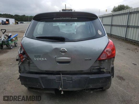2012 Nissan Versa S with VIN 3N1BC1CP9CL358495, listed as a Copart auction lot 71660964 with 133,982 mi miles and Salvage Title. Bid and sale history available at carsss.com. Image 6.