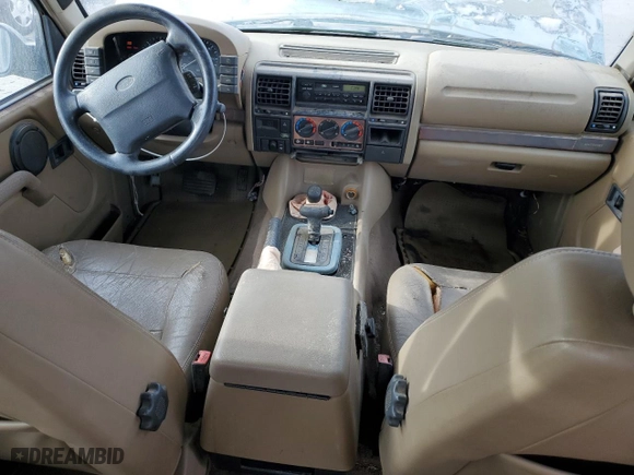 1997 Land Rover Discovery SD with VIN SALJY1249VA705067, listed as a Copart auction lot 77047054 with 146,965 mi miles and Clean Title. Bid and sale history available at carsss.com. Image 8.