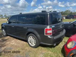 2016 Ford Flex SEL z VIN 2FMGK5C83GBA09724, wystawiony jako Copart lot #80993314 z przebiegiem 188 103 mil mil oraz Czysty tytuł • Clean title. Historia ofert i sprzedaży dostępna na DreamBid. Obrazek 3.