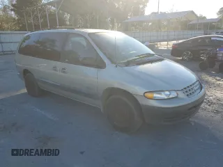 1999 Plymouth Voyager Grand SE z VIN 2P4GP44G3XR431744, wystawiony jako Copart lot #87659415 z przebiegiem Nie podano mil oraz Szkody całkowita. Historia ofert i sprzedaży dostępna na DreamBid. Obrazek 4.