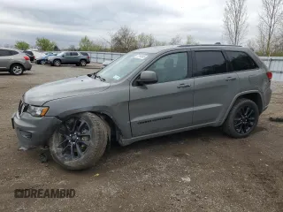 2020 Jeep Grand Cherokee Laredo E with VIN 1C4RJFAG1LC313080, listed as a Copart auction lot 52190895 with 90,591 mi miles and Salvage title. Bid and sale history available at DreamBid. Image 1.