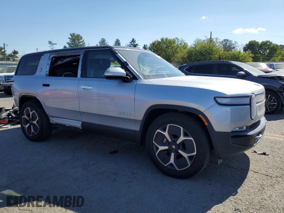 2024 Rivian R1S Adventure with VIN 7PDSGBBA4RN036045, listed as a Copart auction lot 74982414 with 9,256 mi miles and Salvage Title. Bid and sale history available at carsss.com. Image 4.