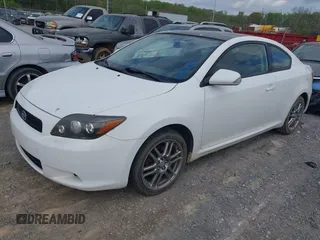 2010 Scion tC with VIN JTKDE3B79A0313508, listed as a IAAI auction lot 41970517 with 163,604 mi miles. Bid and sale history available at carsss.com. Image 2.