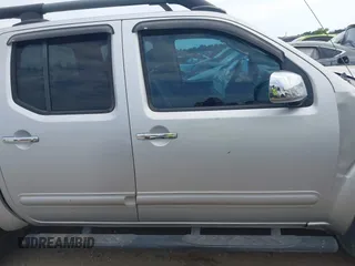 2011 Nissan Frontier Pro-4X with VIN 1N6AD0EV6BC427890, listed as a IAAI auction lot 42316203 with 259,337 mi miles and . Bid and sale history available at DreamBid. Image 13.
