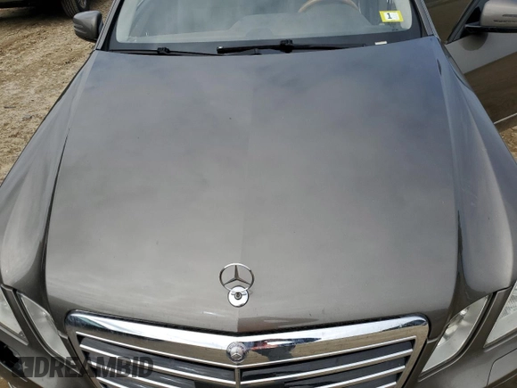 2011 Mercedes-Benz E-Class E 550 Luxury with VIN WDDHF9AB1BA385318, listed as a Copart auction lot 66115634 with 197,595 mi miles and Salvage Title. Bid and sale history available at carsss.com. Image 12.
