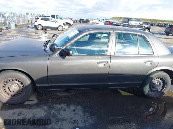 1999 Ford Crown Victoria Police с VIN 2FAFP71W9XX187581, выставлен на аукционе IAAI как лот 41522223 с пробегом 94 889 миль миль и . История ставок и продаж доступна на DreamBid. Изображение 14.