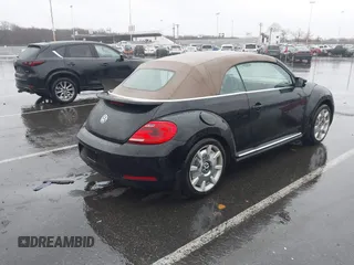 2013 Volkswagen Beetle 2.5L with VIN 3VW5P7AT8DM832656, listed as a IAAI auction lot 41729356 with 124,156 mi miles and . Bid and sale history available at DreamBid. Image 4.