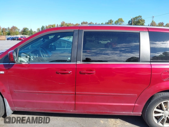 2014 Dodge Grand Caravan SXT with VIN 2C4RDGCG8ER311850, listed as a IAAI auction lot 40598088 with 138,010 mi miles and . Bid and sale history available at DreamBid. Image 14.