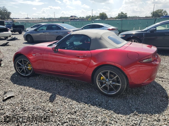 2020 Mazda MX-5 Miata Grand Touring z VIN JM1NDAD79L0415751, wystawiony jako Copart lot #71864574 z przebiegiem Nie podano mil oraz Szkoda całkowita • Salvage title. Historia ofert i sprzedaży dostępna na DreamBid. Obrazek 2.