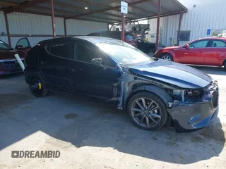 2021 Mazda 3 Select with VIN JM1BPBKL3M1402652, listed as a IAAI auction lot 42208110 with 19,002 mi miles and . Bid and sale history available at DreamBid. Image 1.