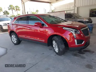 2024 Cadillac XT5 FWD Luxury with VIN 1GYKNAR42RZ738679, listed as a IAAI auction lot 42355530 with 14,660 mi miles and . Bid and sale history available at DreamBid. Image 1.