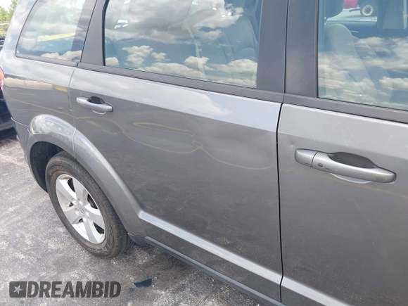 2013 Dodge Journey SE with VIN 3C4PDCAB3DT626929, listed as a IAAI auction lot 42318702 with Not provided miles and . Bid and sale history available at DreamBid. Image 13.