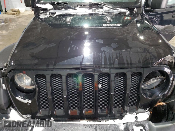 2020 Jeep Wrangler Sport S with VIN 1C4GJXAN0LW131400, listed as a Copart auction lot 44266995 with 73,576 mi miles and Salvage title. Bid and sale history available at DreamBid. Image 12.