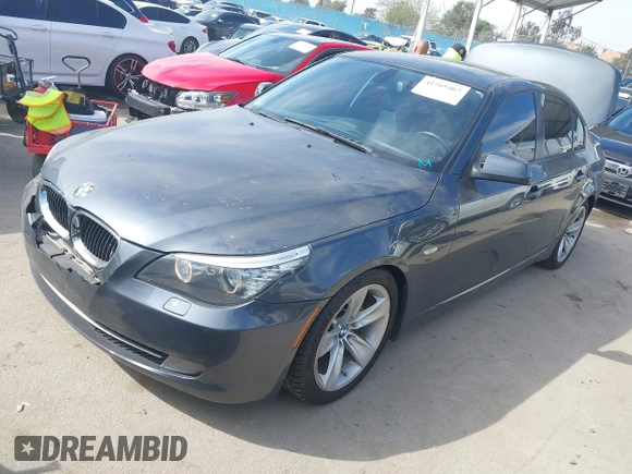 2010 BMW 5 Series 528i with VIN WBANU5C52AC129868, listed as a IAAI auction lot 41765467 with 228,161 mi miles and . Bid and sale history available at carsss.com. Image 2.