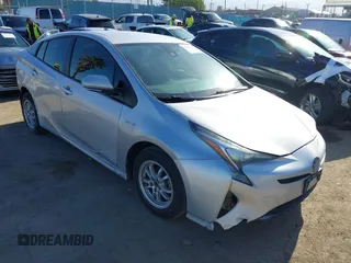 2018 Toyota Prius Two z VIN JTDKBRFU7J3079829, wystawiony jako IAAI lot #42260117 z przebiegiem 181 501 mil mil oraz . Historia ofert i sprzedaży dostępna na DreamBid. Obrazek 1.