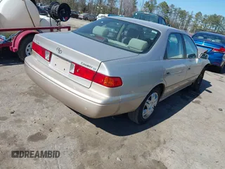 2001 Toyota Camry CE with VIN 4T1BG22K71U027796, listed as a IAAI auction lot 41749025 with 167,917 mi miles and . Bid and sale history available at DreamBid. Image 4.