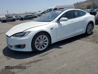 2017 Tesla Model S 60 with VIN 5YJSA1E16HF198903, listed as a Copart auction lot 60601565 with Not provided miles and Clean title. Bid and sale history available at DreamBid. Image 1.
